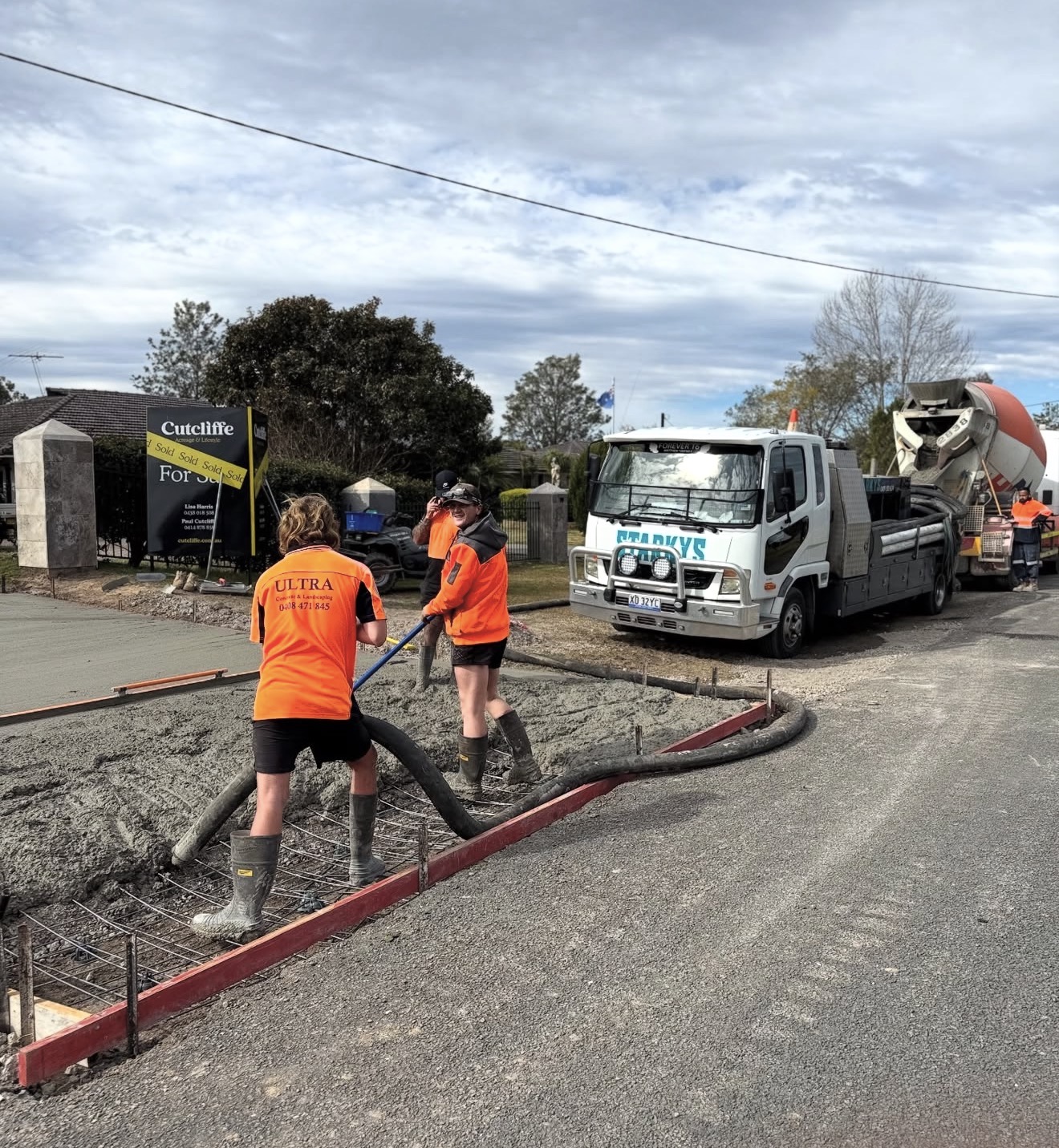 Street concrete pour with Starkys truck